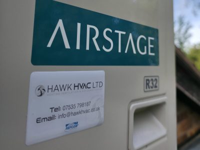 Air stage HVAC unit with company branding and contact information for heating, ventilation, and air conditioning services.